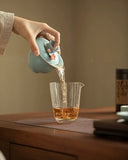 Hand-Sculpted "Azure Petals" Ru Ware Floating Sancai Gaiwan