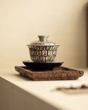 Gilded Silver "Ten Thousand Buddhas" Grottoes Sancai Gaiwan